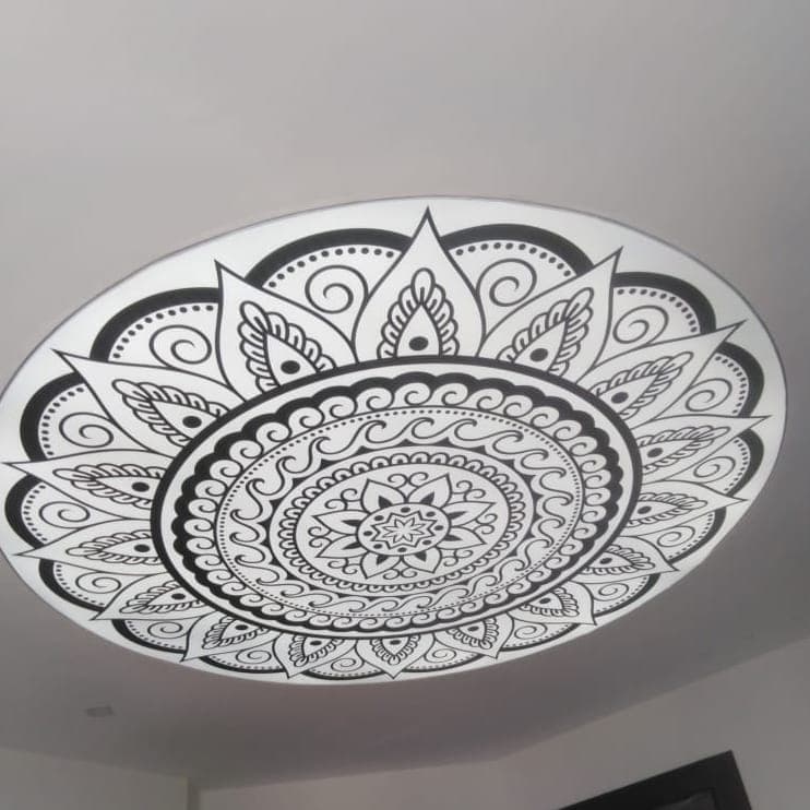 Circular stretch ceiling printed with a black and white mandala